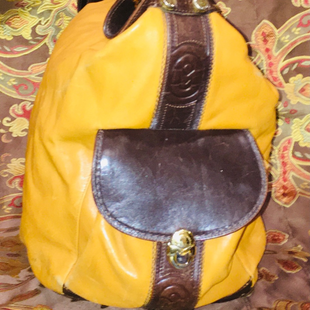 Leather over the shoulder sling bag.